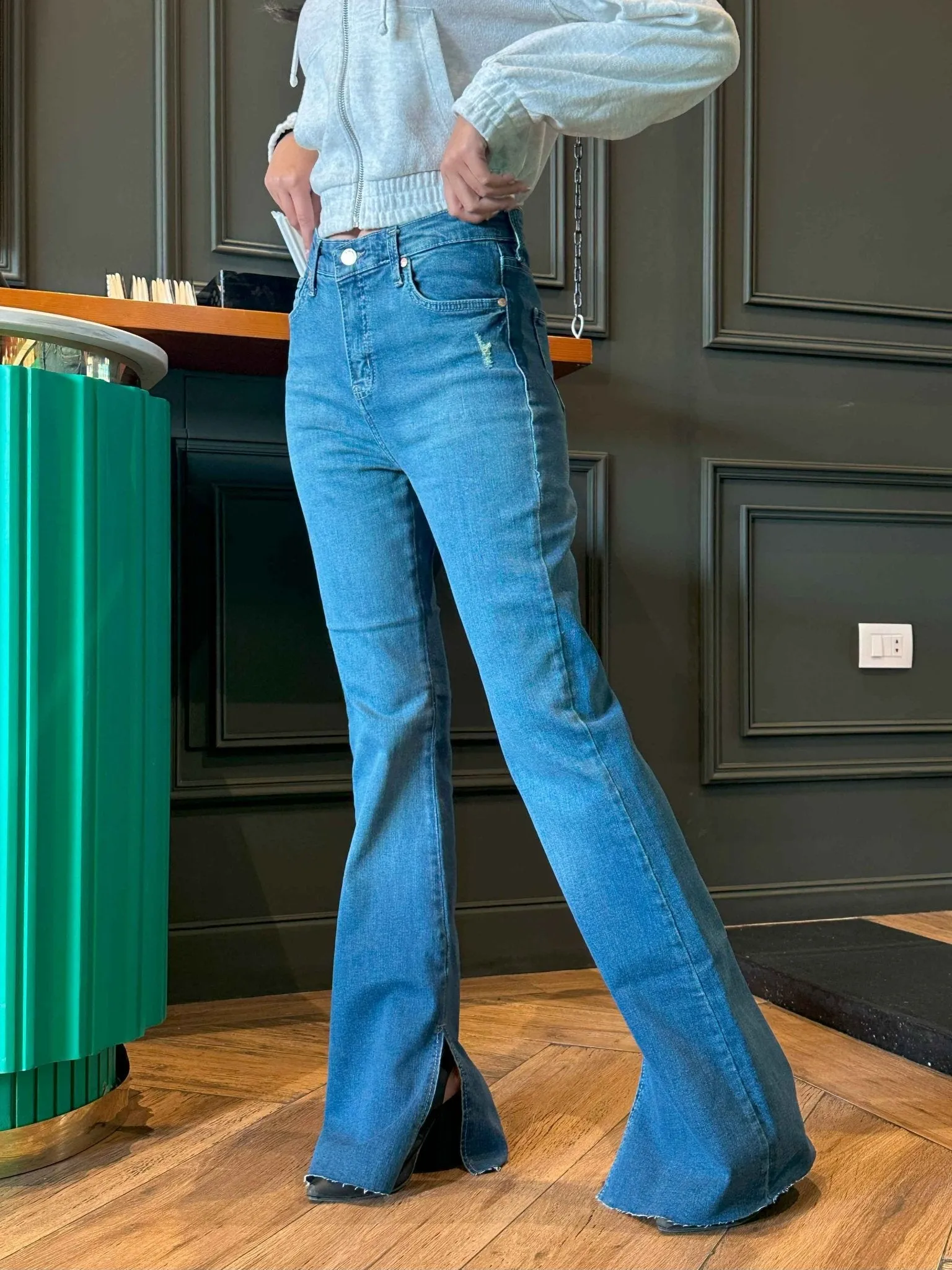 Flared - Medium Blue Wash Split Hem Jeans.