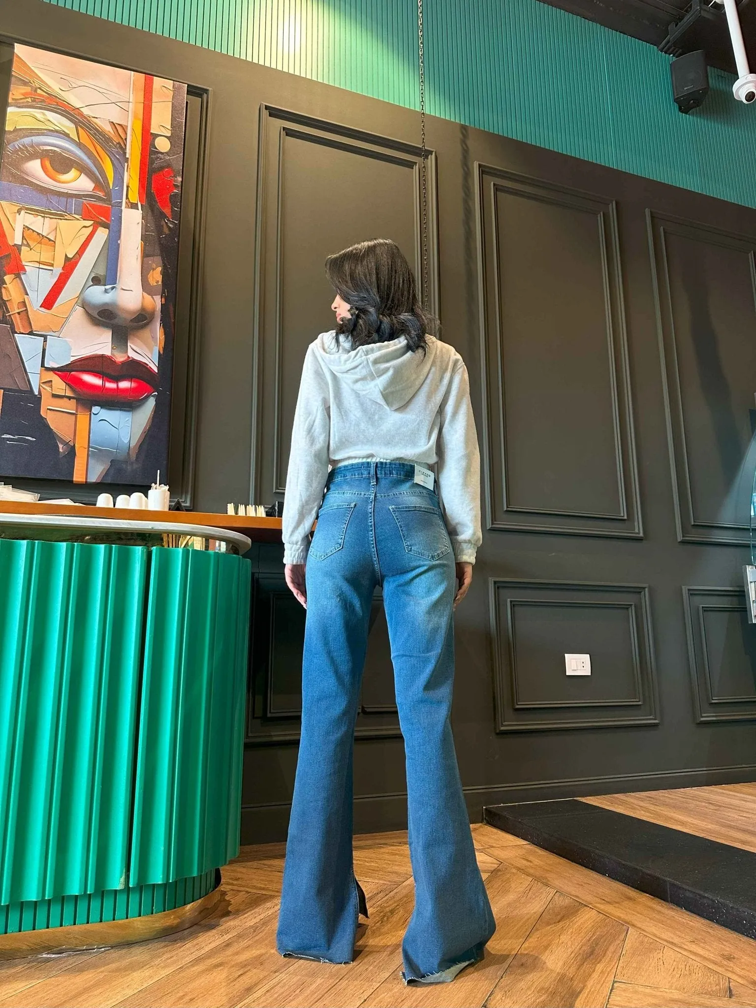 Flared - Medium Blue Wash Split Hem Jeans.
