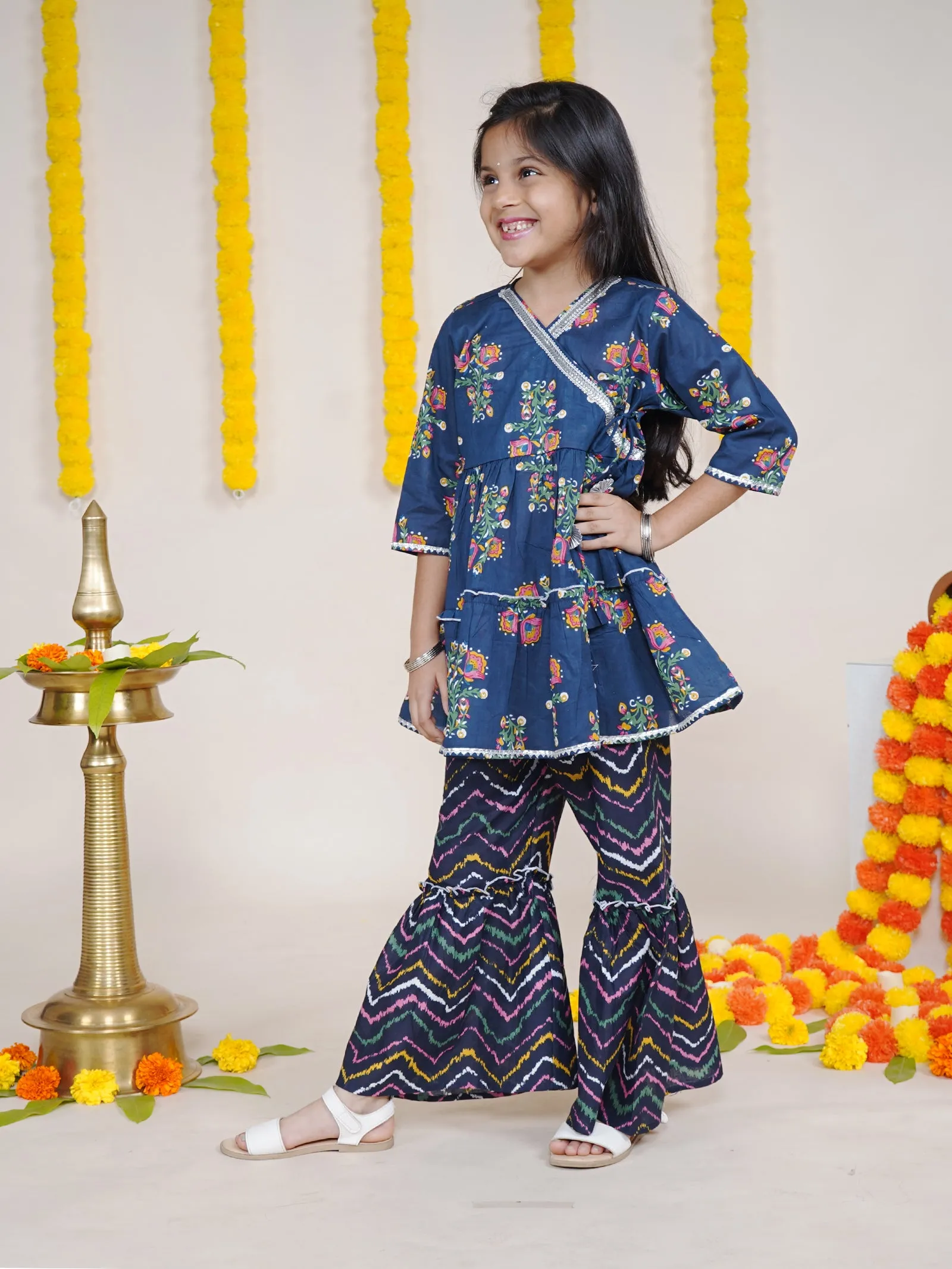 Girls Floral Printed Kurta With Geometric Printed Sharara & Potli Set
